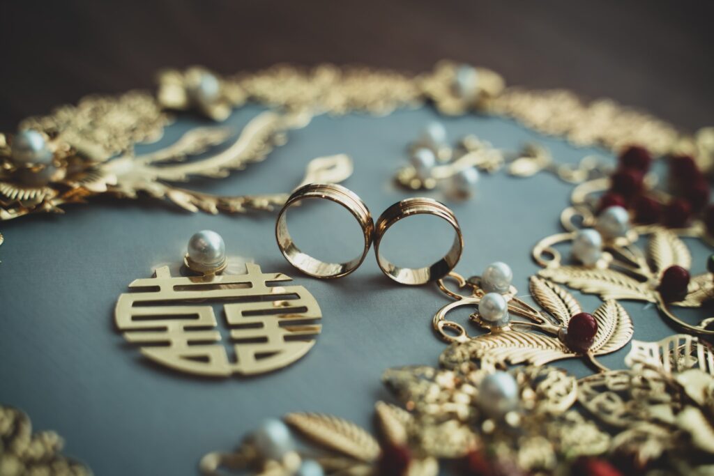 Gold jewelry items on a table